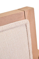 Orsina Dining Chair featuring a light wood frame and soft beige upholstery for modern interiors