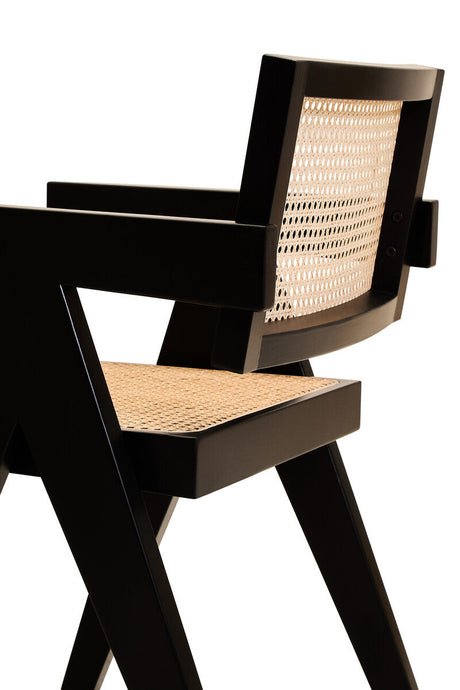 Orsina Dining Chair with a stylish black frame and woven cane backrest for modern interiors