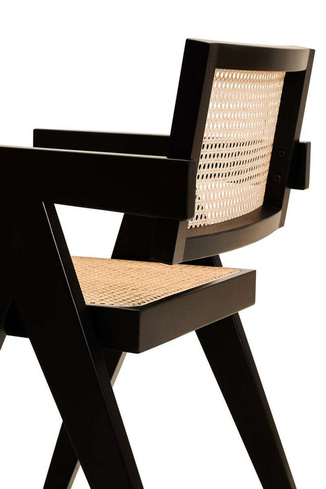Orsina Dining Chair with a stylish black frame and woven cane backrest for modern interiors