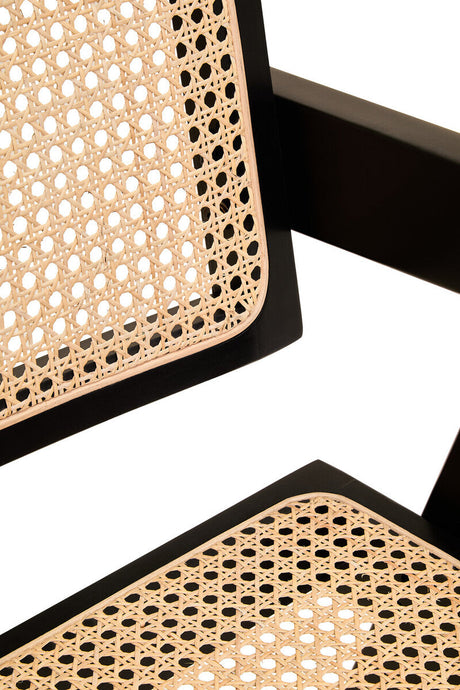 Orsina Dining Chair with a stylish black frame and woven cane seat for modern interiors