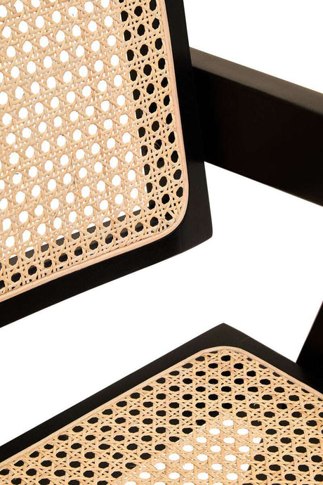 Orsina Dining Chair with a stylish black frame and woven cane seat for modern interiors