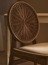 Orsina Dining Chair with a round woven back and cushioned seat for stylish dining