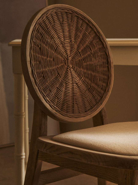 Orsina Dining Chair with a round woven back and cushioned seat for stylish dining