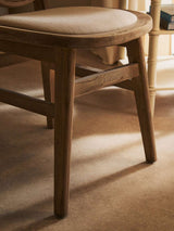 Orsina Dining Chair with a smooth wooden frame and cushioned seat for comfortable dining