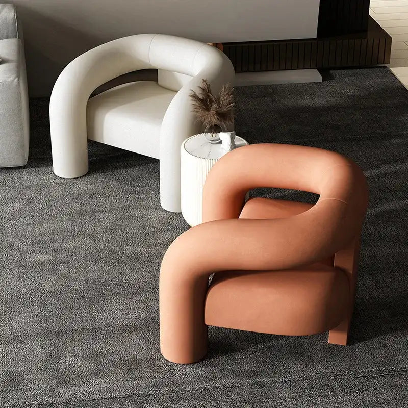 Stylish Nisu Home Dining Chair in orange with curved design for modern interiors