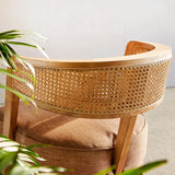 Nisu Home Dining Chair Set featuring a curved rattan backrest and wooden legs for modern interiors