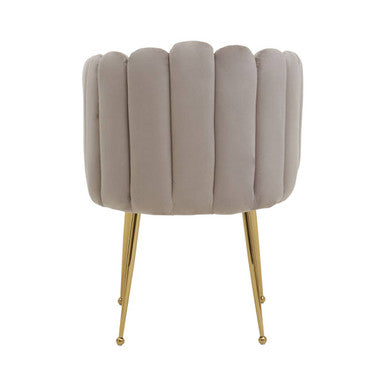 Elegant Orsina Dining Chair with plush upholstery and stylish gold legs for modern interiors