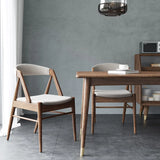Modern Nisu Home Dining Chair with wooden frame and soft fabric seat for stylish dining rooms