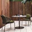 Stylish Nisu Home Dining Chair in green, perfect for modern outdoor dining spaces