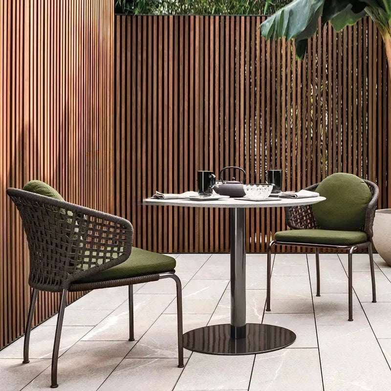 Stylish Nisu Home Dining Chair in green, perfect for modern outdoor dining spaces