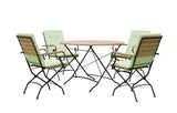 MINT Outdoor Dining Set featuring a round table and four green cushioned chairs