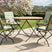 MINT Outdoor Dining Set featuring a round table and two comfortable folding chairs