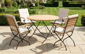 MINT Outdoor Dining Set featuring a round wooden table and four elegant folding chairs