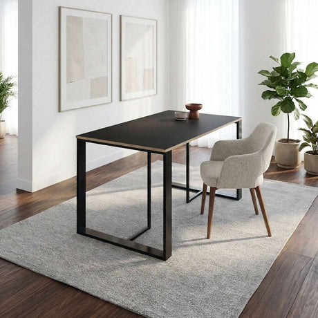 Decortie modern dining table with minimalistic design and sturdy black frame in a bright dining room