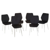Orsina Dining Table and Chair Set featuring six stylish black upholstered chairs with chrome legs