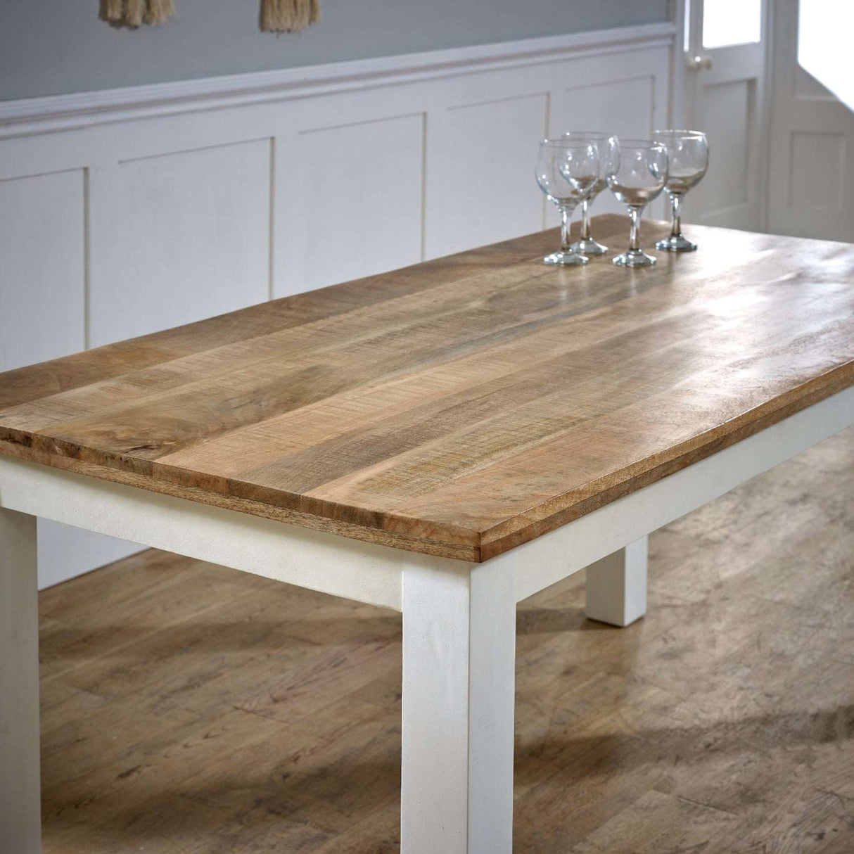 Verty Furniture Dining Table with a rustic wooden top and white painted legs, perfect for family gatherings.