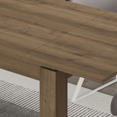 Decortie Dining Table with a rustic wooden finish and sturdy legs for modern dining spaces