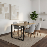 Decortie Dining Table in a Modern Dining Room Setup with Grey Chairs and Minimalist Decor