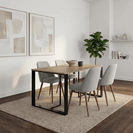 Decortie Dining Table in a Modern Dining Room Setup with Grey Chairs and Minimalist Decor