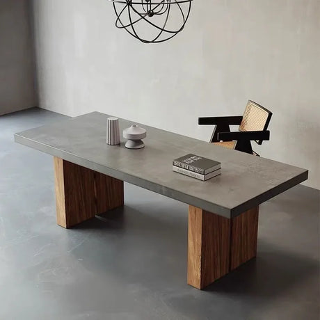 Nisu Home Dining Table with a sleek concrete top and wooden block legs, perfect for modern dining spaces