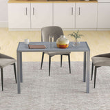 Modern grey Dining Table by Wise Galleria with stylish chairs in a contemporary kitchen setting