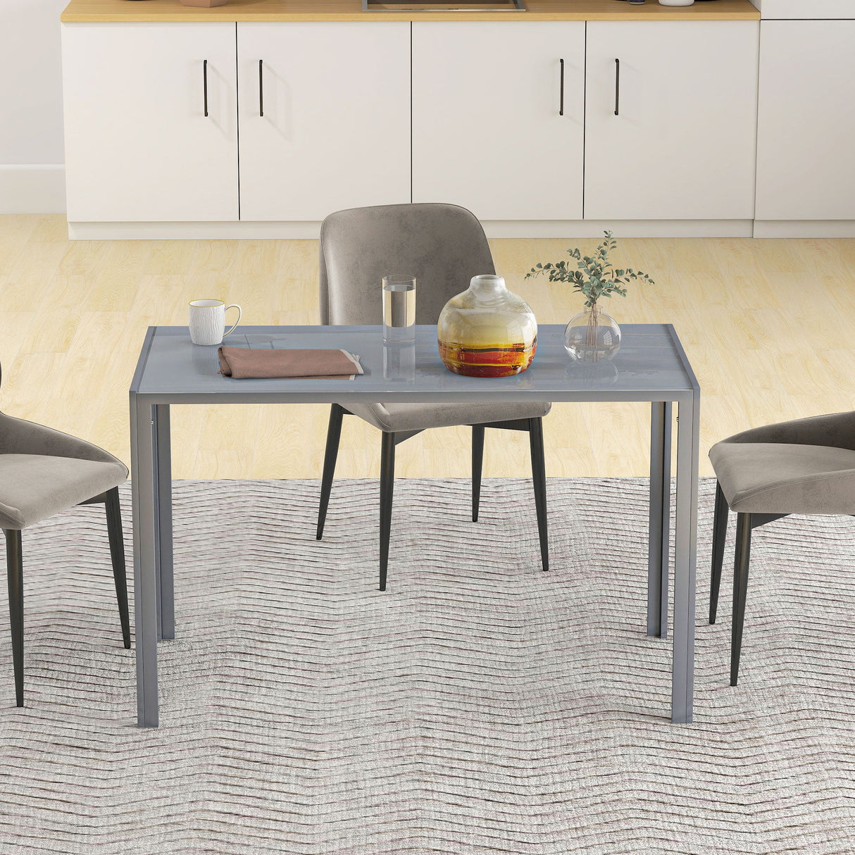 Modern grey Dining Table by Wise Galleria with stylish chairs in a contemporary kitchen setting