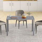 Modern grey Dining Table by Wise Galleria with stylish chairs in a contemporary kitchen setting