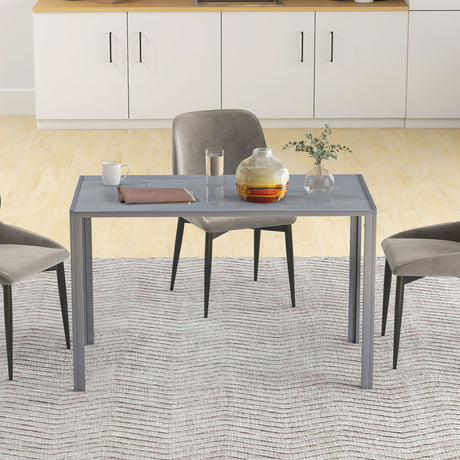 Modern grey Dining Table by Wise Galleria with stylish chairs in a contemporary kitchen setting