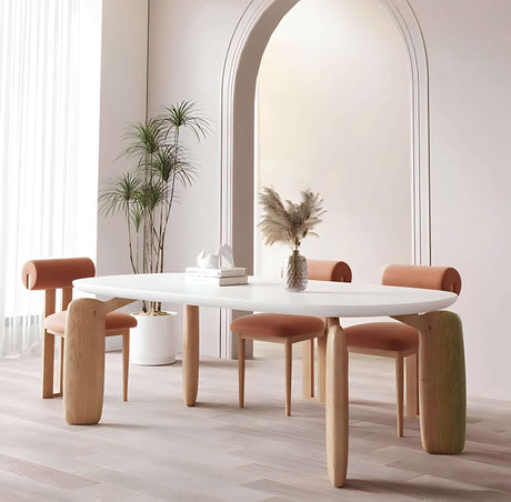 Nisu Home Modern Dining Table with a White Top and Wooden Legs, Surrounded by Stylish Chairs