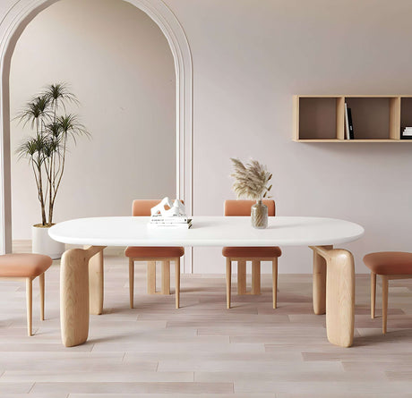 Contemporary Nisu Home Dining Table with Oval Design and Wooden Legs for Modern Interiors