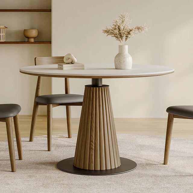 Nisu Home stylish round Dining Table with a unique pedestal base and minimalist design for modern dining rooms