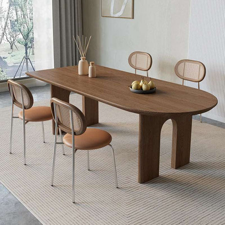 Nisu Home Dining Table in Wood Finish with Oval Shape and Stylish Chairs for Modern Dining Rooms