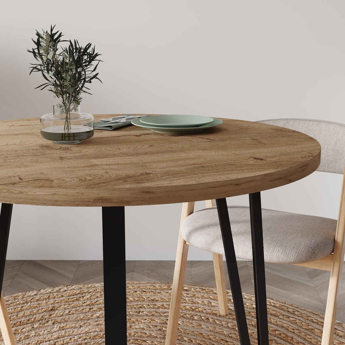 Stylish Decortie Dining Table with an Oval Wooden Top and Minimalist Black Legs