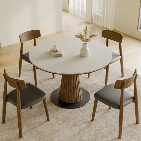 Modern Nisu Home Dining Table with Round Top and Stylish Wood Base, Surrounded by Elegant Chairs