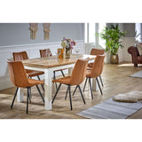 Verty Furniture Dining Table in a stylish dining room with six brown leather chairs