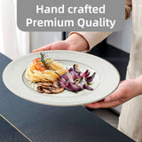 Handcrafted premium quality dinner plates featuring decorative edge and elegant design for fine dining
