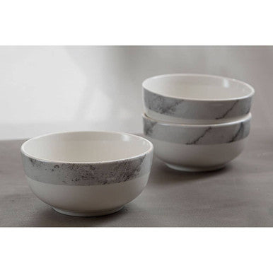 Orsina Dinner Set featuring three stylish bowls with marble design for elegant dining