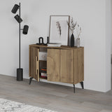 Decortie display unit in wood finish with sleek doors, styled with black floor lamp and modern decor