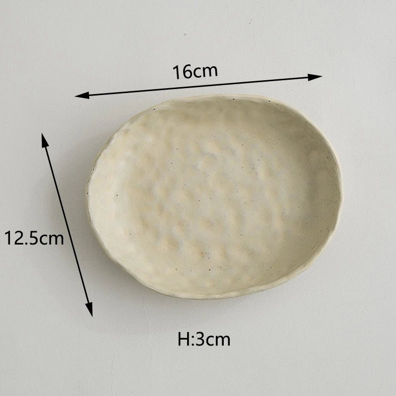 Doshim Tableware oval ceramic plate in cream colour measuring 16cm by 12.5cm with textured finish