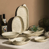 Doshim Tableware set in textured ceramic, includes bowls and plates for elegant dining experiences