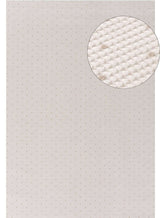 Textured Dots Rug in neutral tones with detailed close-up view of material for stylish home decor