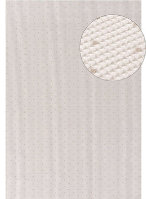 Textured Dots Rug in neutral tones with detailed close-up view of material for stylish home decor