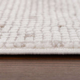 Close-up of a soft Dots Rug in cream colour, showcasing its plush texture and design