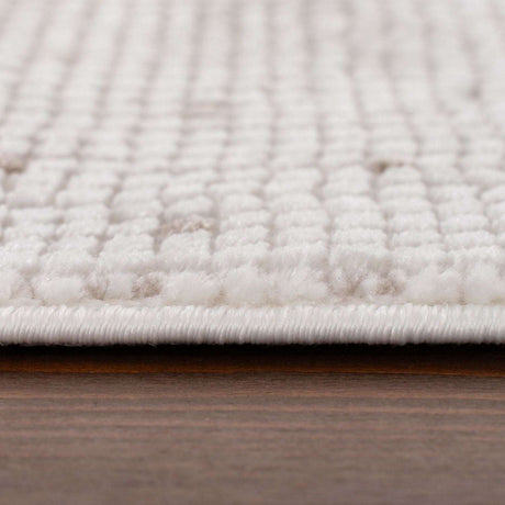 Close-up of a soft Dots Rug in cream colour, showcasing its plush texture and design