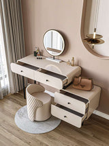 Le Di Vita modern dressing table with a round mirror and storage drawers in an elegant setting