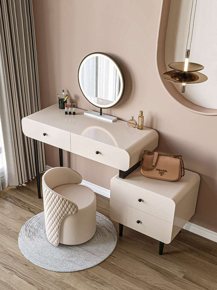 Elegant Le Di Vita dressing table with circular mirror and stylish chair in a modern interior setting