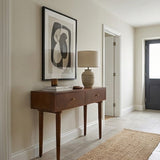 Stylish Fishe and Lilly dressing table with wooden finish and elegant lamp in a contemporary room