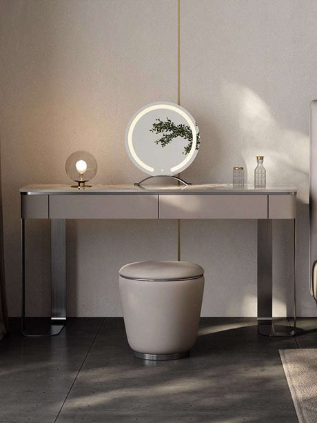 Elegant Le Di Vita Dressing Table with a round mirror and sleek metal legs, perfect for modern bedrooms