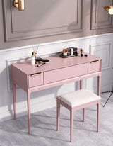 Elegant pink dressing table with two drawers and a matching stool for stylish makeup applications