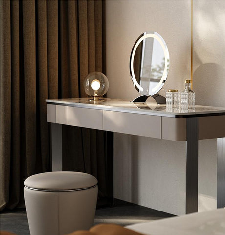 Le Di Vita modern dressing table with a round mirror and stylish stool in a sophisticated bedroom setting